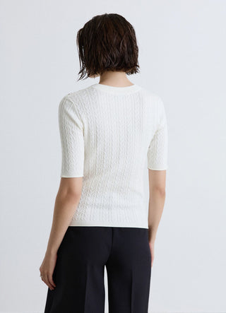 T-shirt in maglia a trecce con bottoni sulle spalle