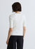 T-shirt in maglia a trecce con bottoni sulle spalle