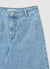 Jeans culotte con tasche applicate