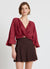 Camicia con nodo con volant