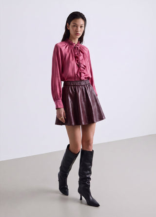 Chemise avec volants et liens au col
