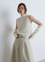 Knitted vest with a shiny openwork effect