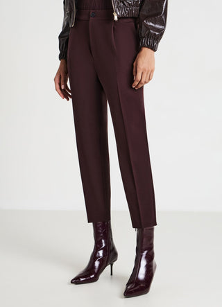 Trousers with pleats