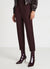 Trousers with pleats