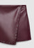 Gonna-pantalone con borchie