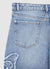 Jeans crop con applicazione farfalla