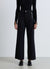 High-waisted palazzo jeans with decorative buttons
