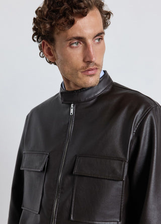 Giacca effetto pelle con zip e tasche applicate