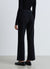 High-waisted palazzo jeans with decorative buttons