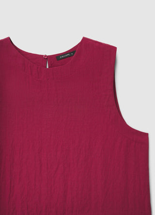 Sleeveless solid-colour blouse