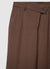 Pantaloni palazzo con patta asimmetrica