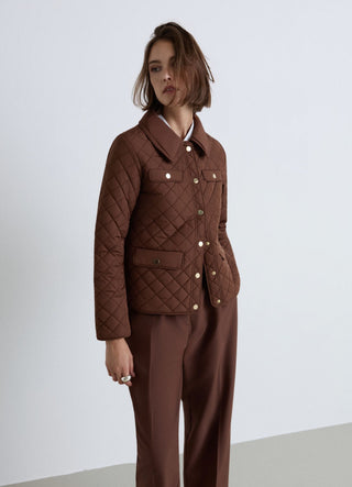 Quilted jacket with snap buttons