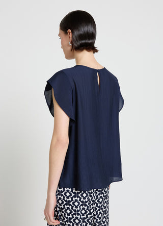 Blusa con maniche a volant