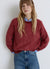 Maglia girocollo con maniche raglan