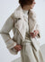 Sheepskin-effect jacket with asymmetrical zip