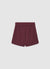 Gonna-pantalone corta con pieghe e fibbia