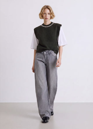 Jeans wide leg con patta asimmetrica