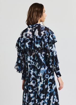 Blusa con fiocco e volant