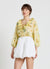 Blusa con volant e laccetti a stampa floreale