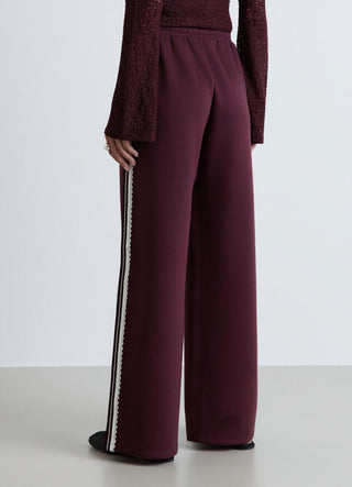 Palazzo trousers with drawstring and lace insert