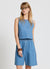 Top in denim con bottoni sul retro