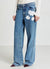 Jeans con applicazioni in pizzo