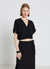 Blusa con scollo a V e orlo con elastico