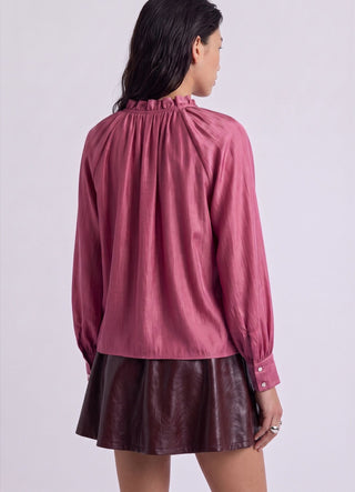 Chemise avec volants et liens au col
