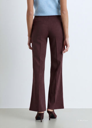 Pantaloni flare con bottoni gioiello