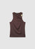 Top con scollo asimmetrico e spilla a fiore