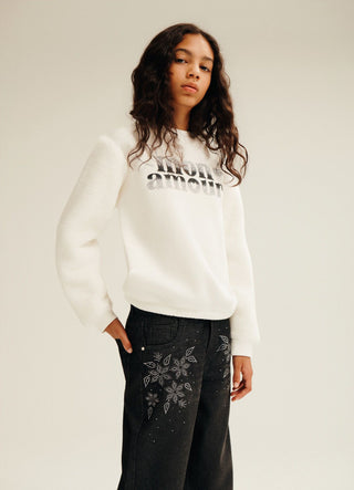 Wide-leg jeans with floral rhinestones