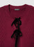 Cardigan crop in maglia con fiocchi