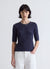 T-shirt in maglia a trecce con bottoni sulle spalle