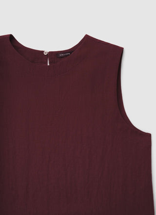 Sleeveless solid-colour blouse
