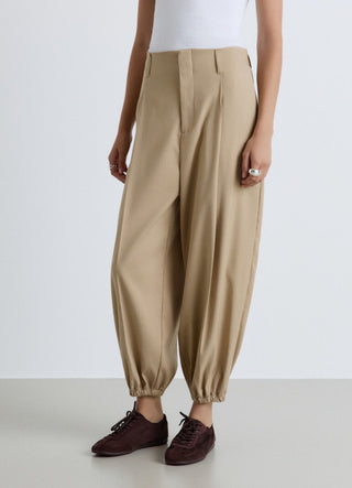 Straight trousers with elasticated hem