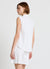Blusa smanicata con colletto classico e scollo a V