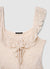Top in pizzo con volant