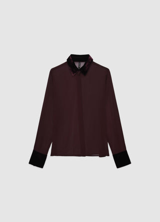 Camicia con abbottonatura nascosta e bottone gioiello