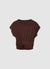 T-shirt con arricciatura e fiore applicato