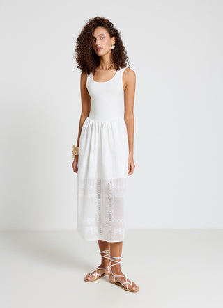 Vestito lungo smanicato con gonna ricamata