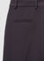 Pantaloni slim con spacchi