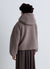 Giubbotto teddy con cappuccio e zip