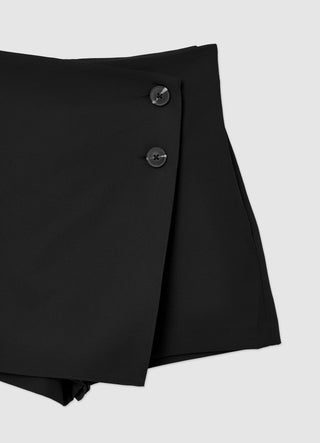 Trouser skirt with asymmetrical panel