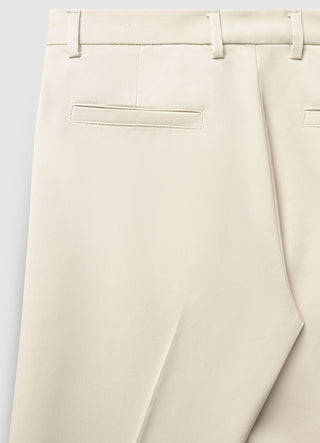 Trousers with pleats