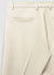 Trousers with pleats