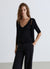 T-shirt a costine con scollo a V e bottoni