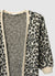 Open cardigan with spotted pattern
