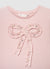 T-shirt with applied bow