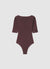 Body in maglia a costine con scollo a V e pizzo