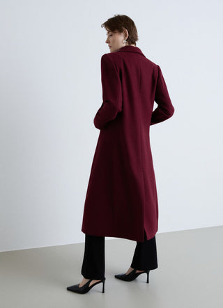 Long coat with single-button closure